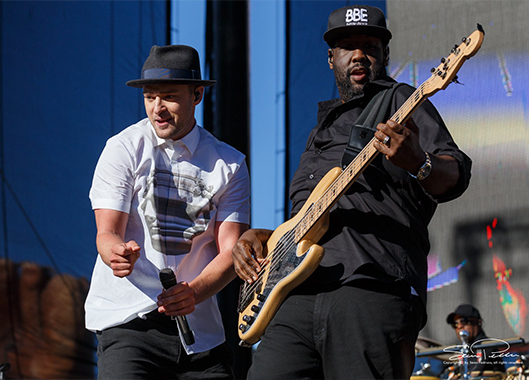 Adam Blackstone playing bass with Justin Timberlake